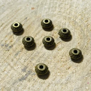 Lot de 20 intercalaires Rond Tibet bronze pour bracelet