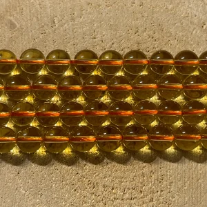 Perles naturelles en Quartz jaune en 8 mm