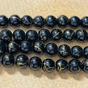 Perles en pierre naturelle en Onyx noir avec lignes dorées en 6 mm
