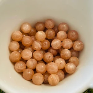 Perles naturelles en Pierre de Soleil en 8 mm (lot de 10)