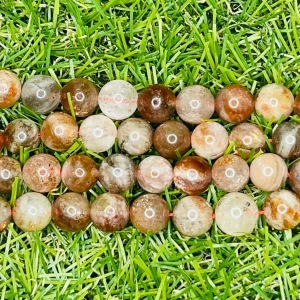 Perles naturelles en Pierre de Soleil multi en 8 mm