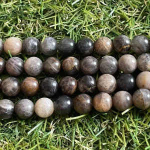 Perles naturelles en Pierre de Soleil noire pèche en 6 mm